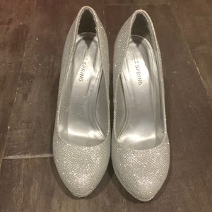 Sparkle silver high heels.